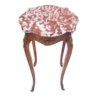 Table with a marble top, France, around 1910.