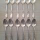 Box of 12 small old spoons in silver metal