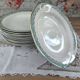 Set of 12 Longwy France earthenware soup plates, Trianon model