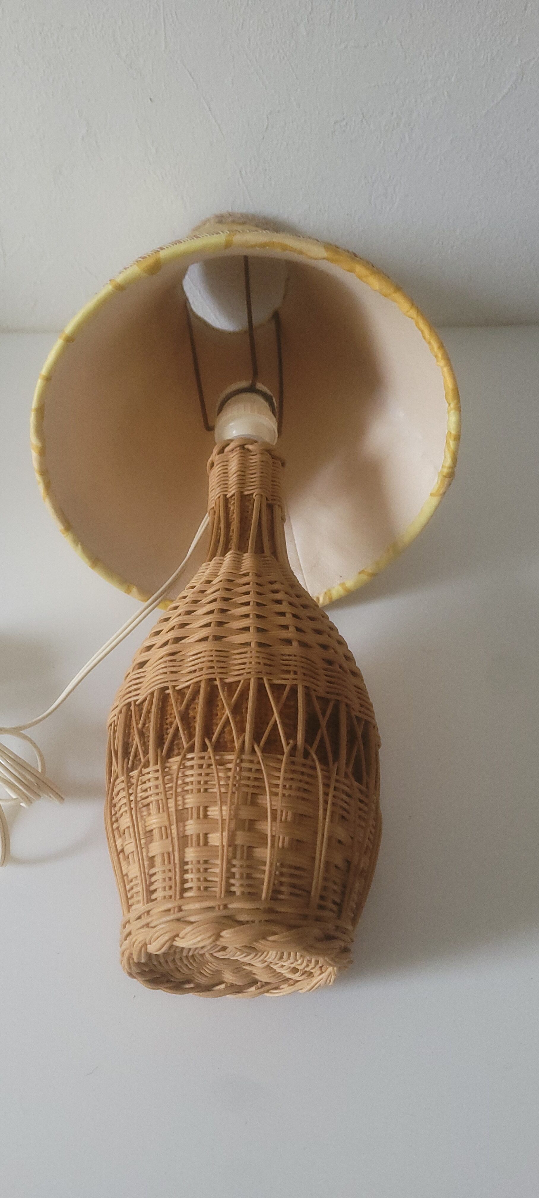 Vintage rattan lamp with yellow shade