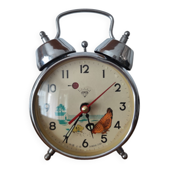 Clock and mechanical alarm clock pecking hen