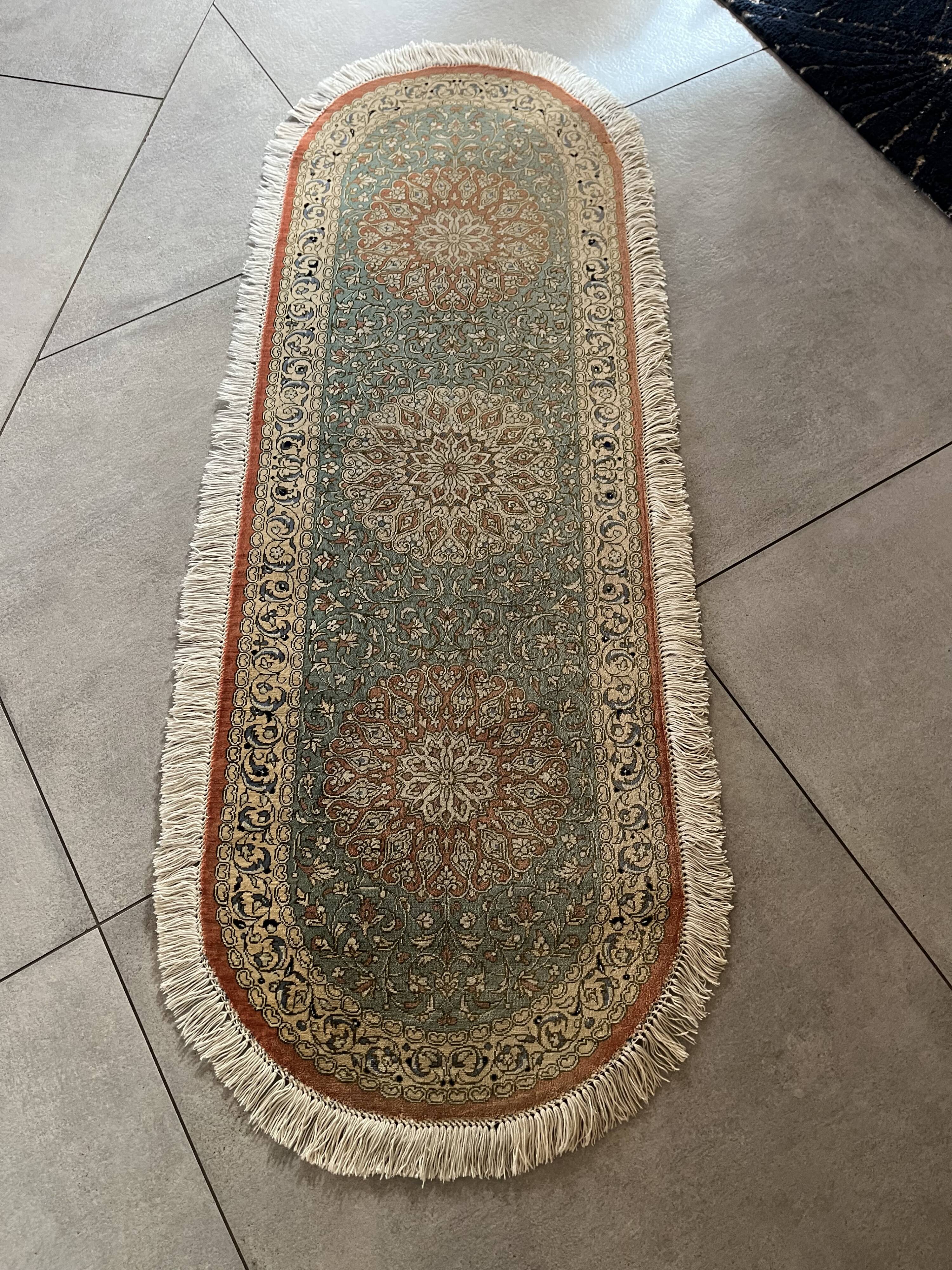 Sino Hereke oval silk rug