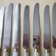 Set of 8 vintage table knives bakelite stainless steel and brass