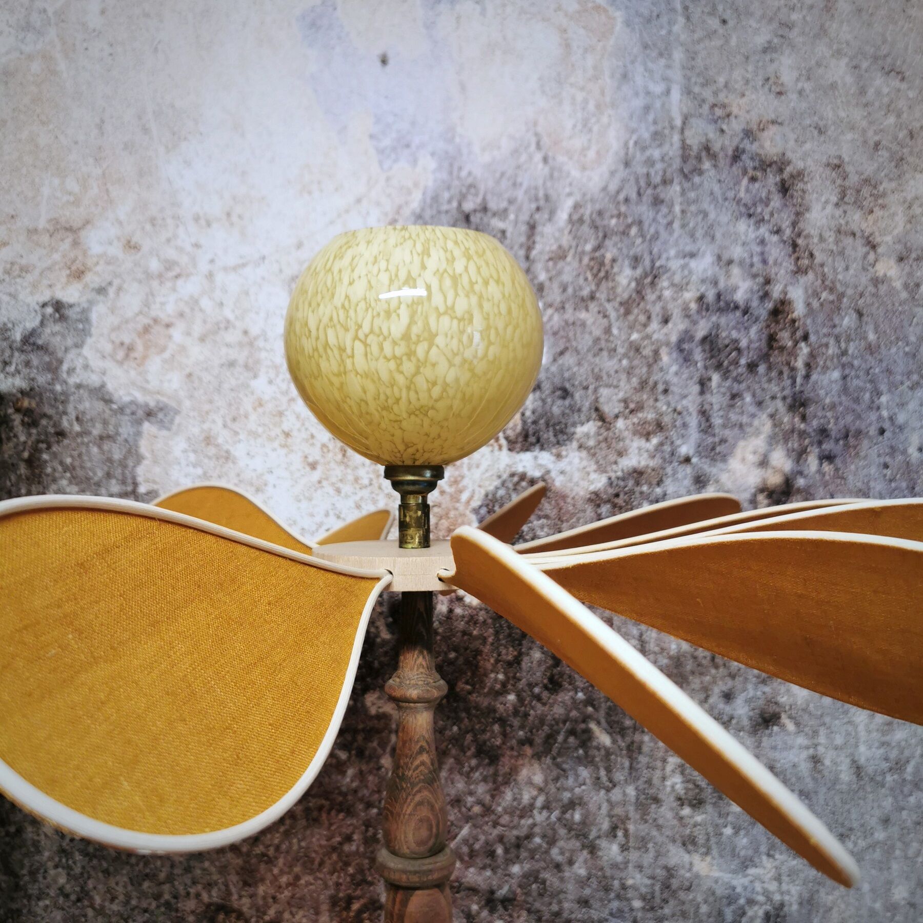 Turned wooden foot lamp and linen and rattan petals