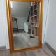 Mirror in an elegant gold frame. 84 x 57.