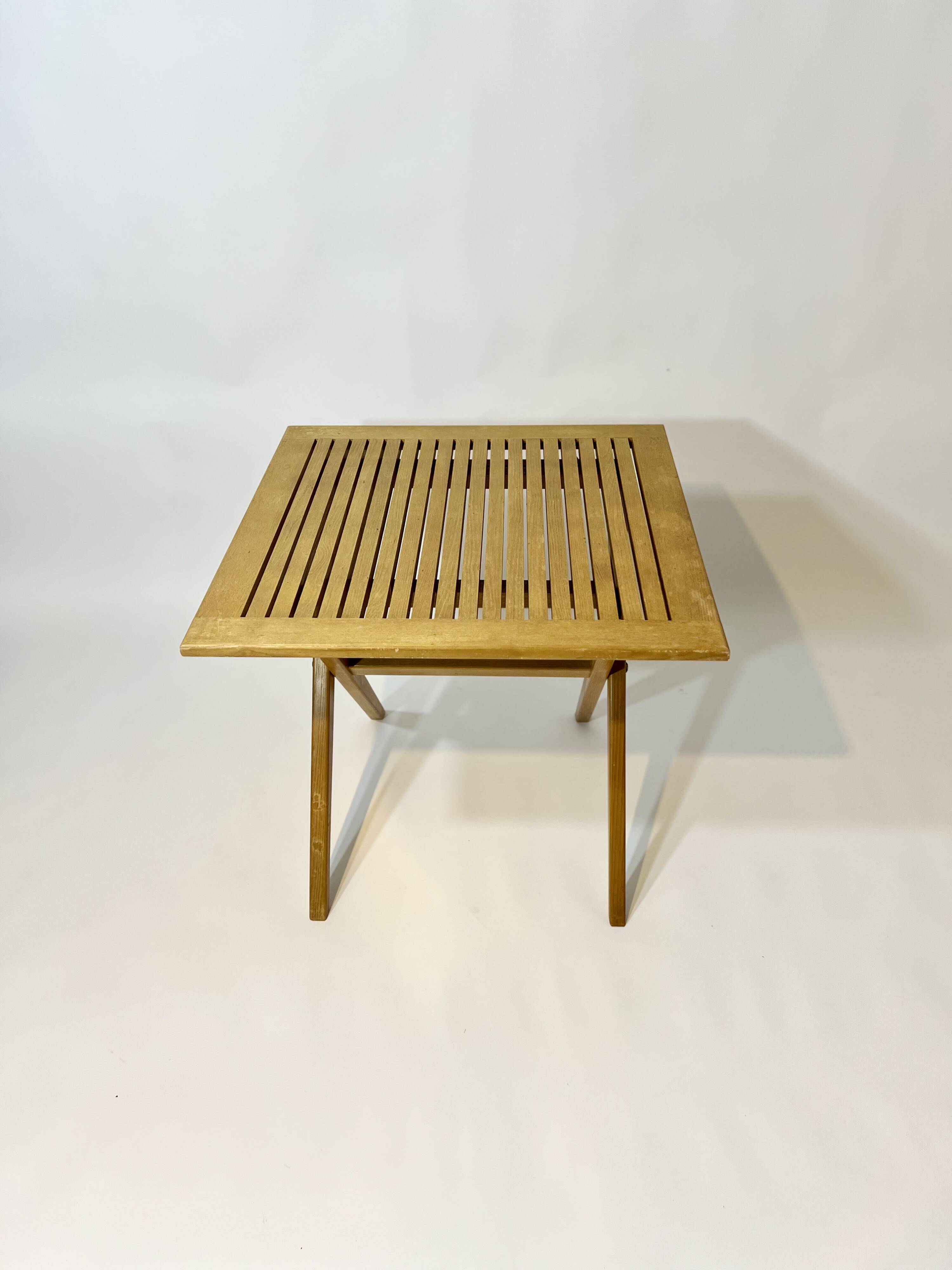 Vintage design solid wood folding scissor table from the 1970s