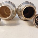 Set of two silver metal sprinklers