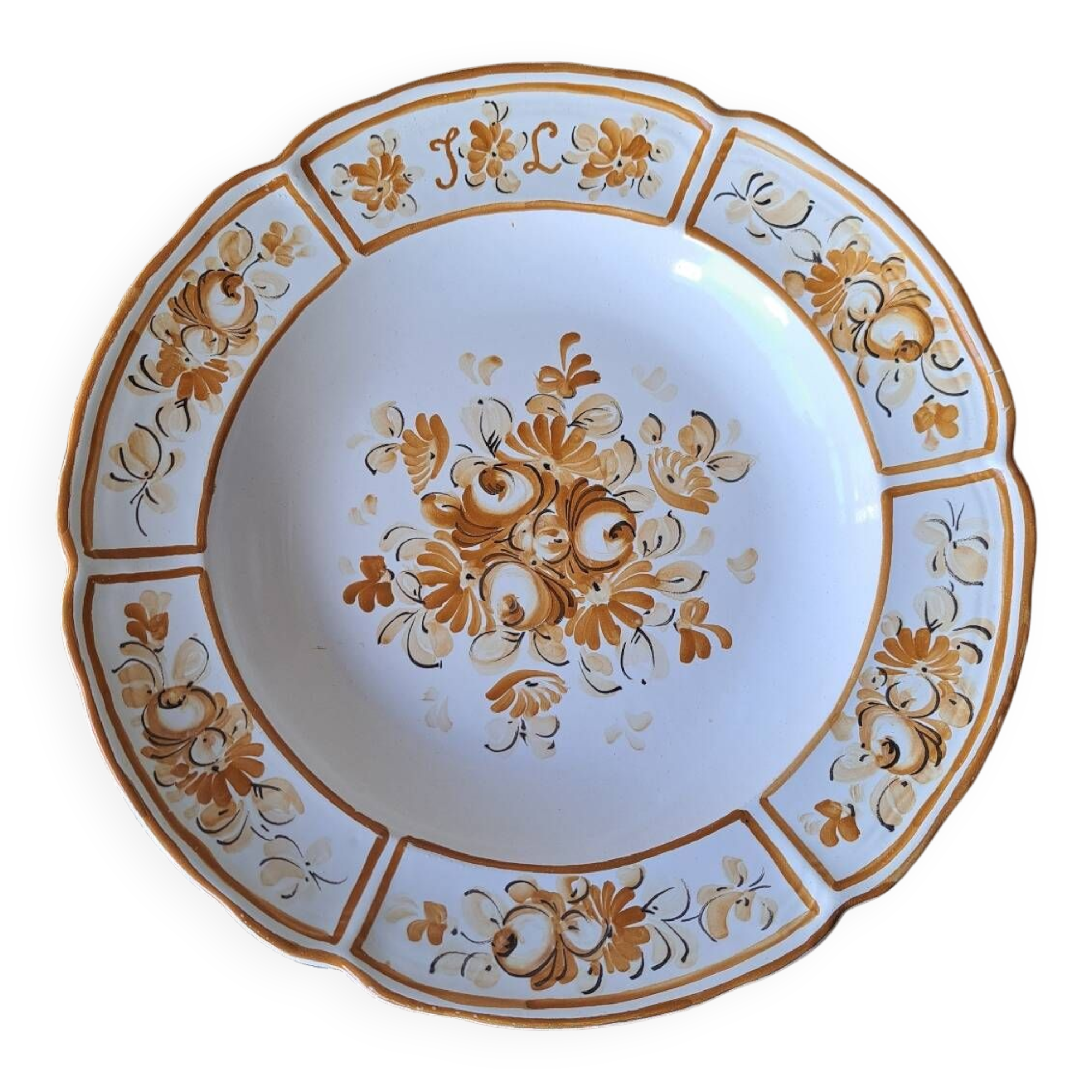 Old painted earthenware dish