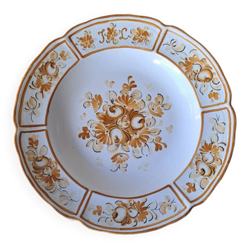 Old painted earthenware dish