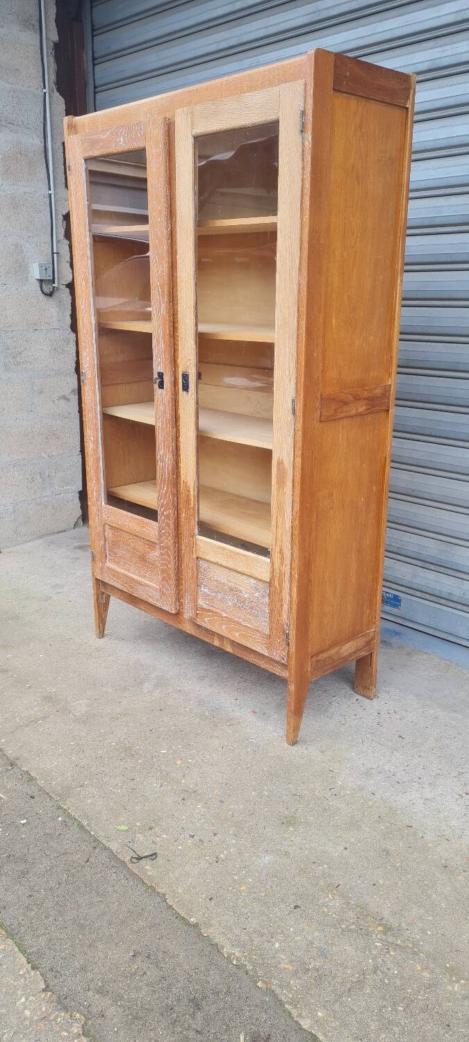 Armoire pied compas en chêne blond
