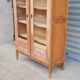Armoire pied compas en chêne blond