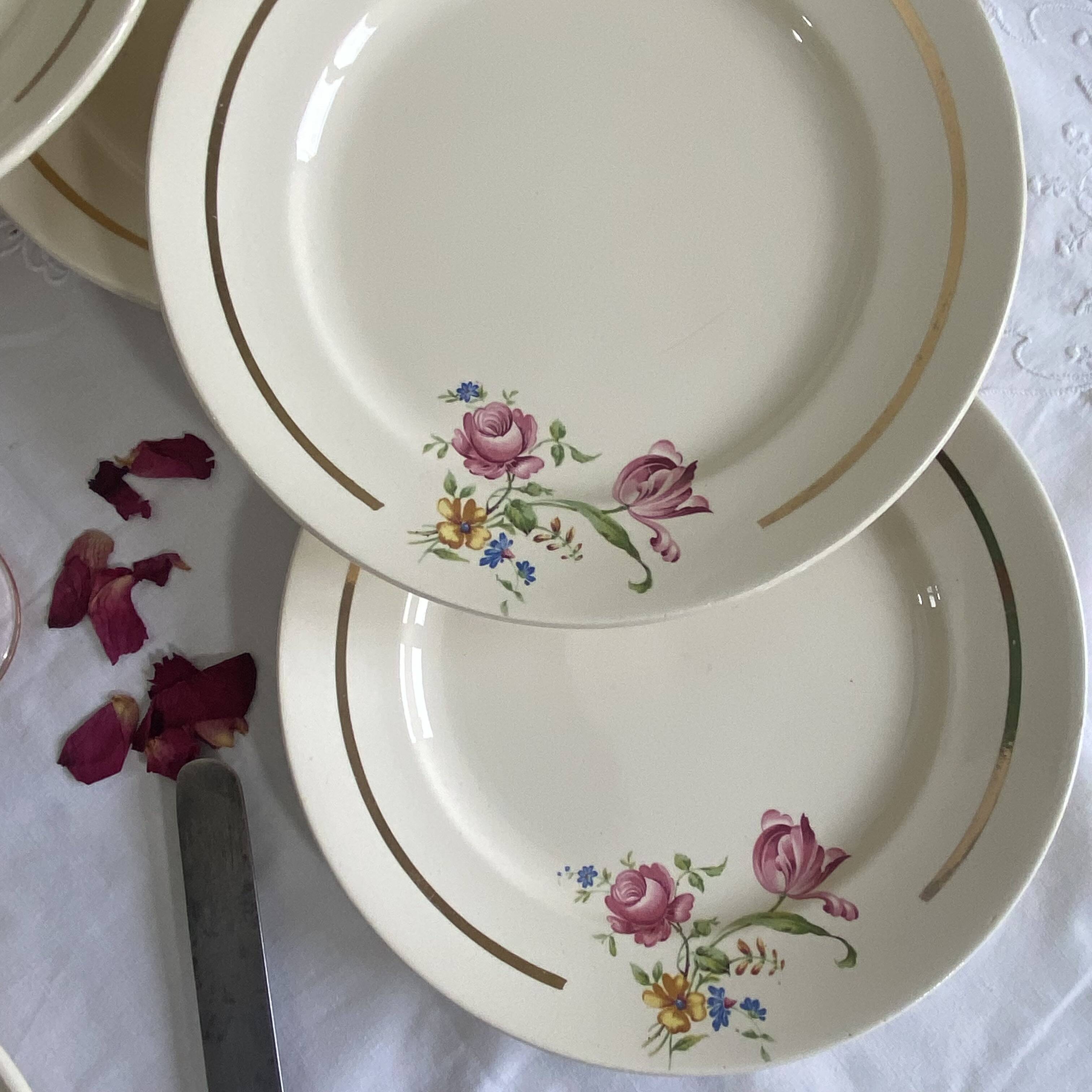 6 antique Badonviller faience dessert plates with flowers and gilding.