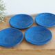 Set of 4 blue enamelled metal plates