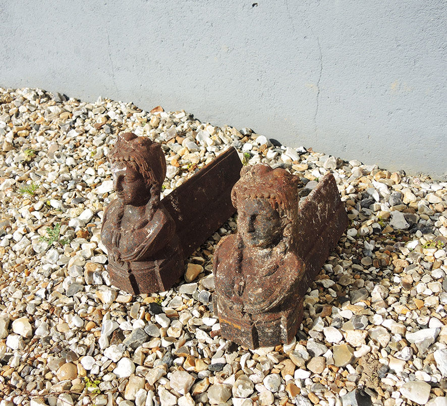 Old cast iron chenets bust of woman with braids