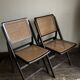 Paire de chaises pliantes cannées 1960