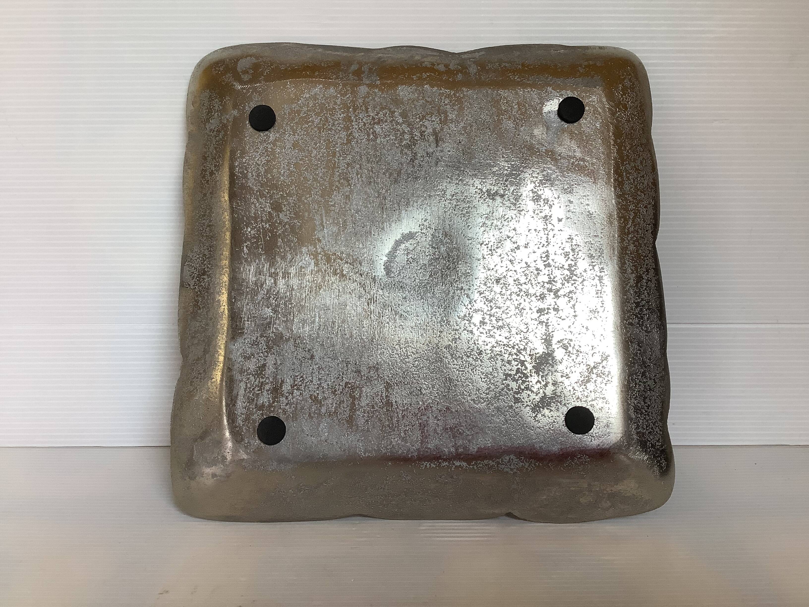 Large empty metal flower pocket