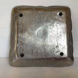 Large empty metal flower pocket