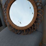 Vintage mirror in rattan flowers, sun