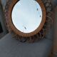 Vintage mirror in rattan flowers, sun