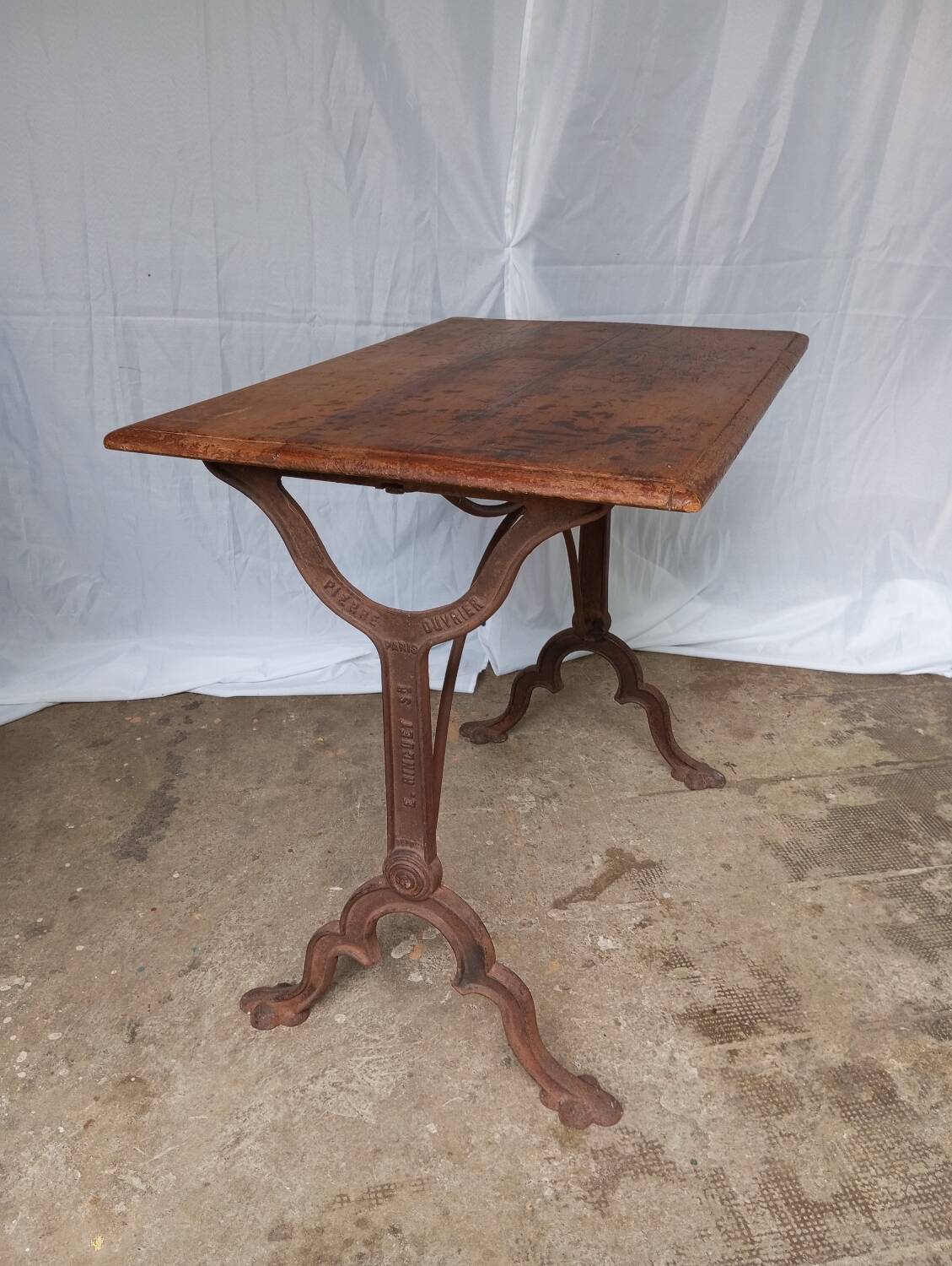 Antique bistro table with lion paws