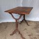 Antique bistro table with lion paws