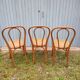 3 antique bistro chairs with canework
