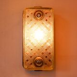 Old wall lamp in cast aluminum and squared glass