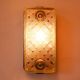 Old wall lamp in cast aluminum and squared glass