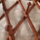 Extendable wall coat rack