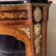 Encoignure galbée style Louis XIV en bois de rose et marquéterie