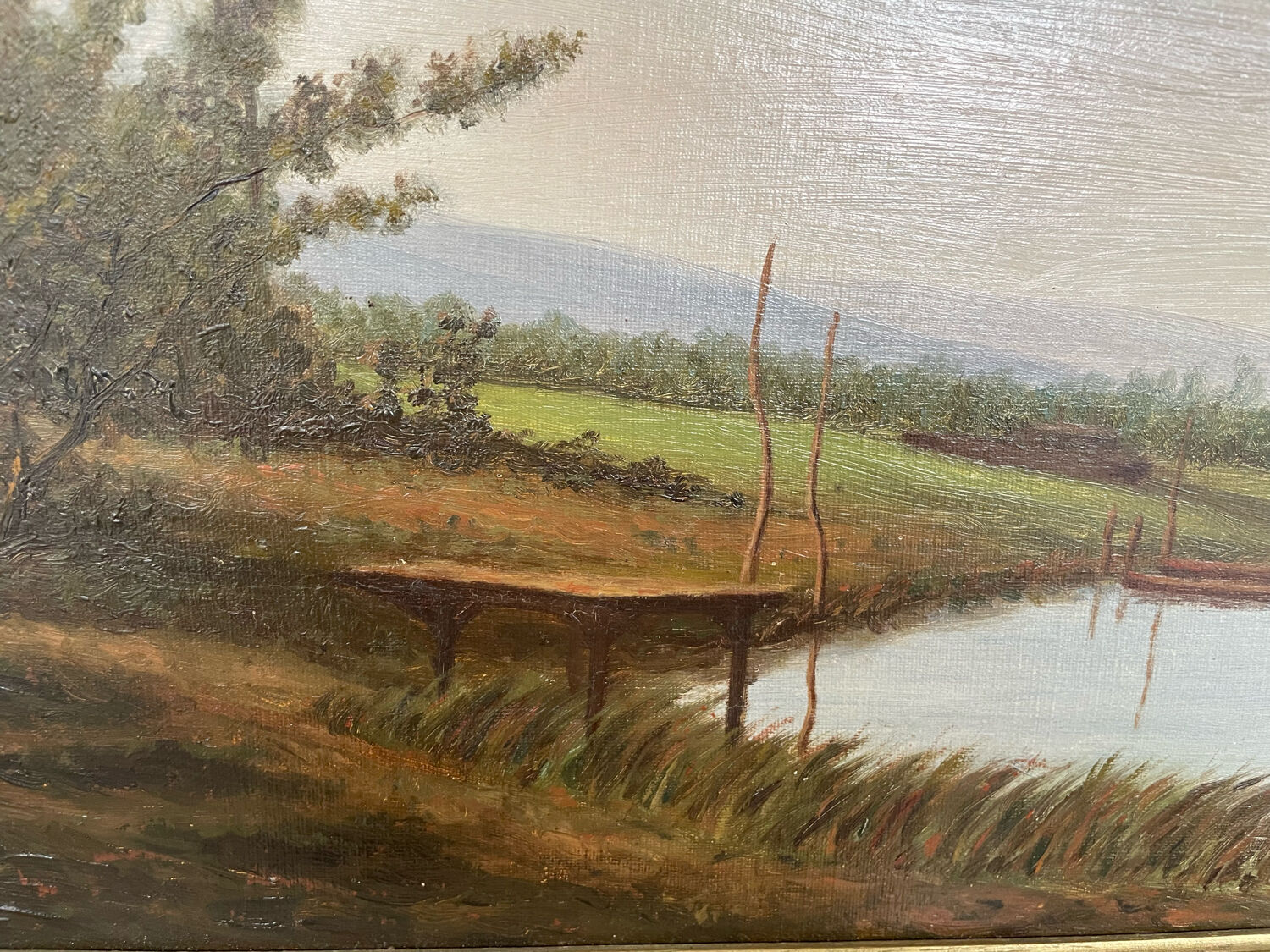 Oil painting of a riverside signed EM
