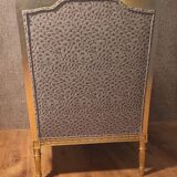 Louis XVI style gilded armchair