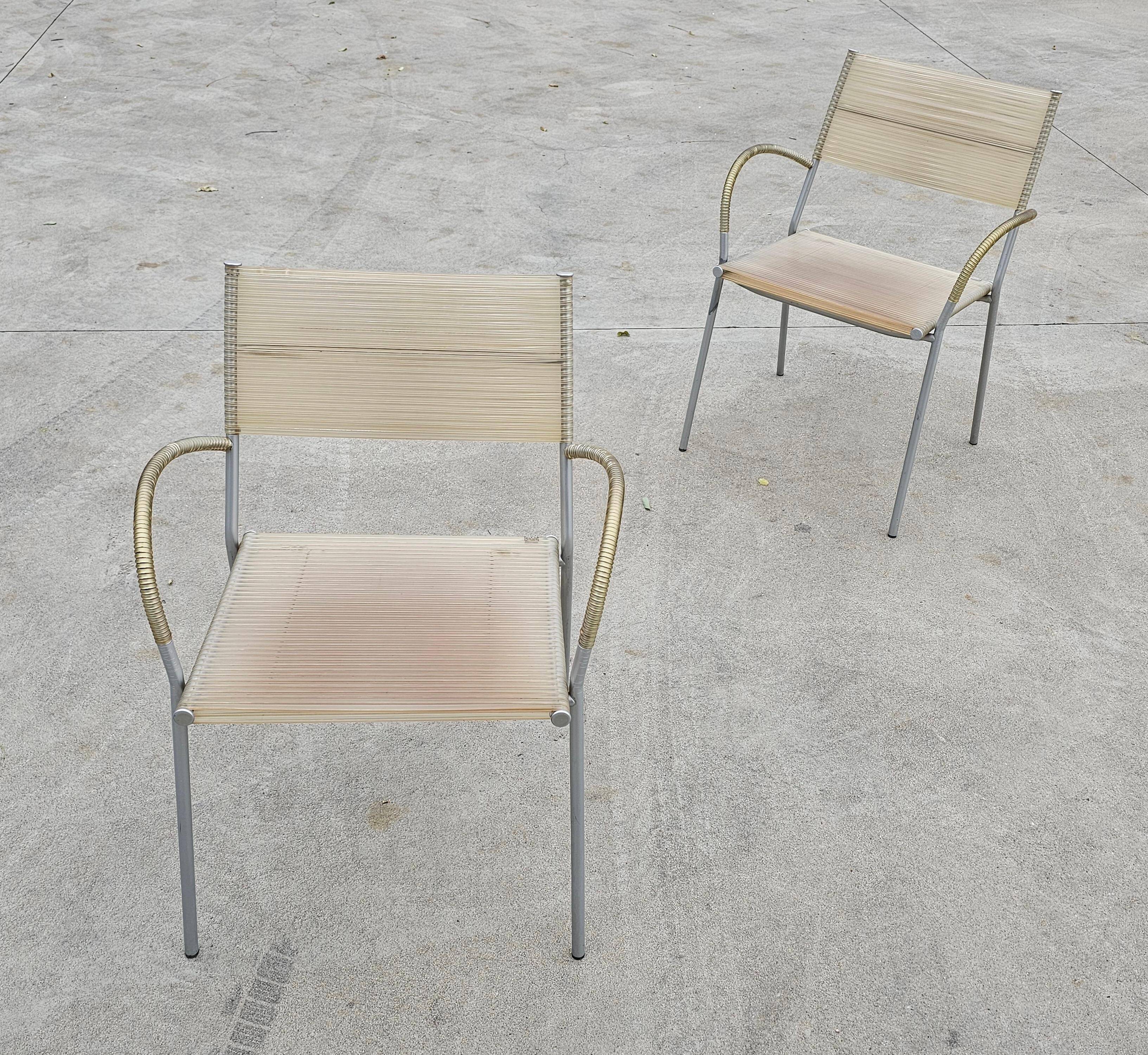 Set of 4 Miss B dining chairs by Tito Agnoli for Bonacina, 1990s.