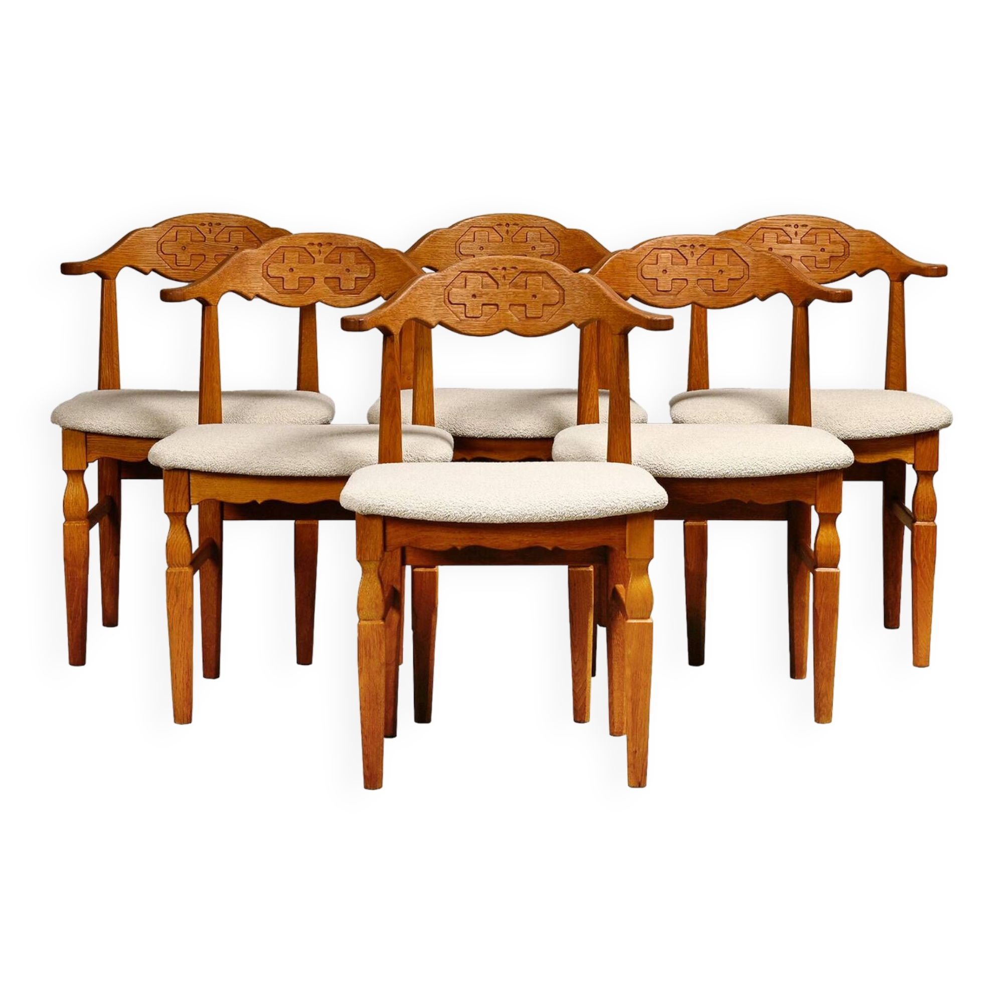 Henning Kjærnulf dining chairs set in Oak and Off White Bouclé, Denmark, 1960s