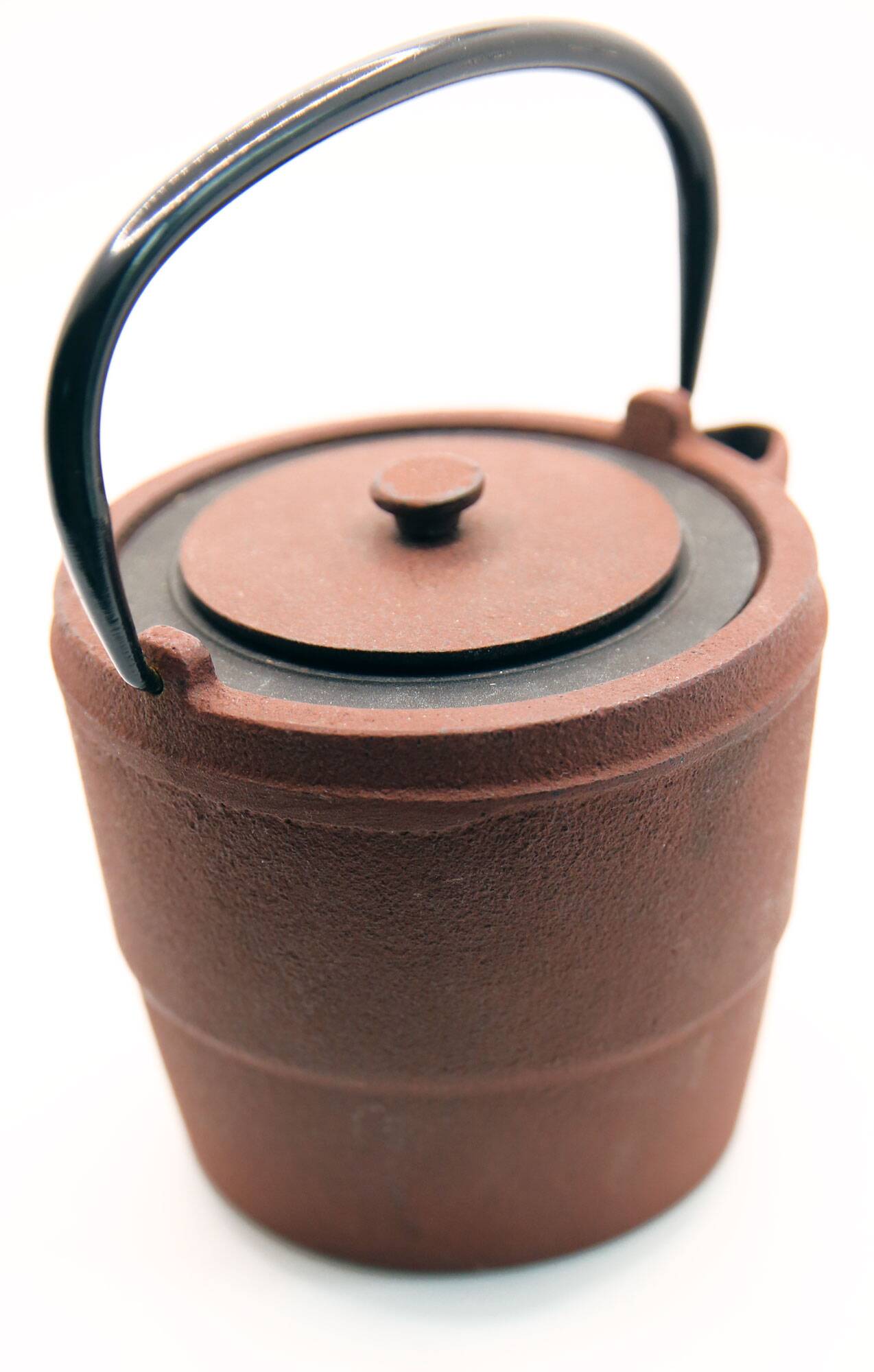 Cast iron chocolate teapot from Japan wabi sabi and its stainless steel filter