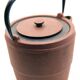 Cast iron chocolate teapot from Japan wabi sabi and its stainless steel filter