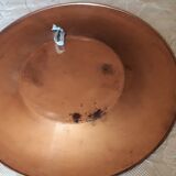 Oriental dish in chiseled red copper
