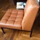 1970s lounge chair in faux leather and black steel
