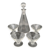 Glassware and bottle set in chiseled glass with flower motif