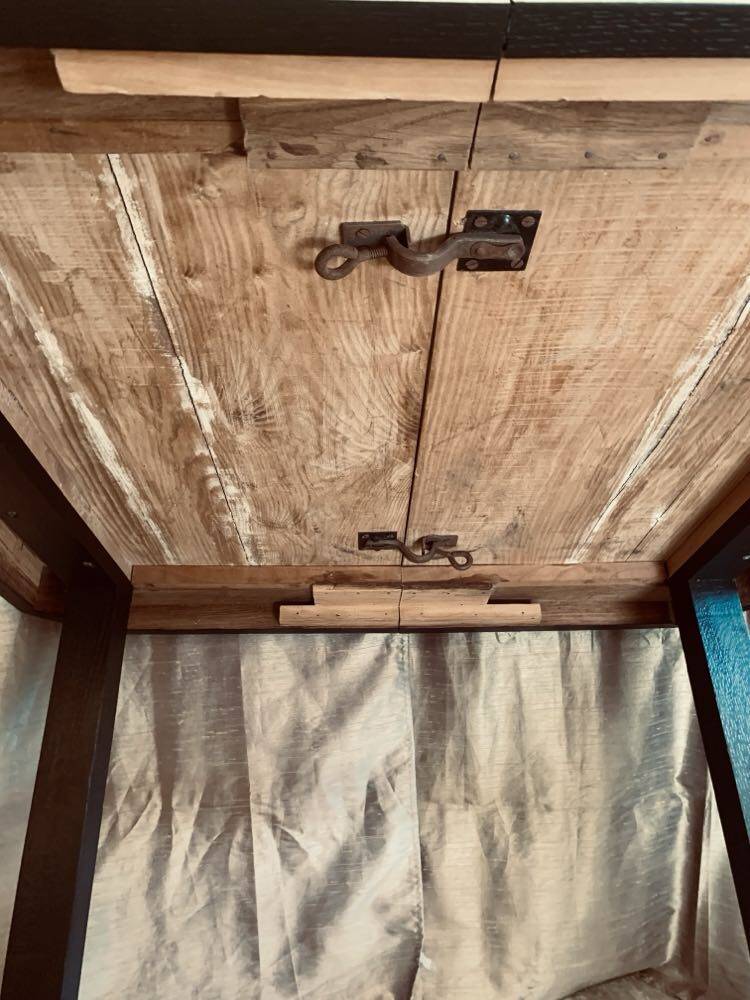 Art Deco dining table with raw wood top