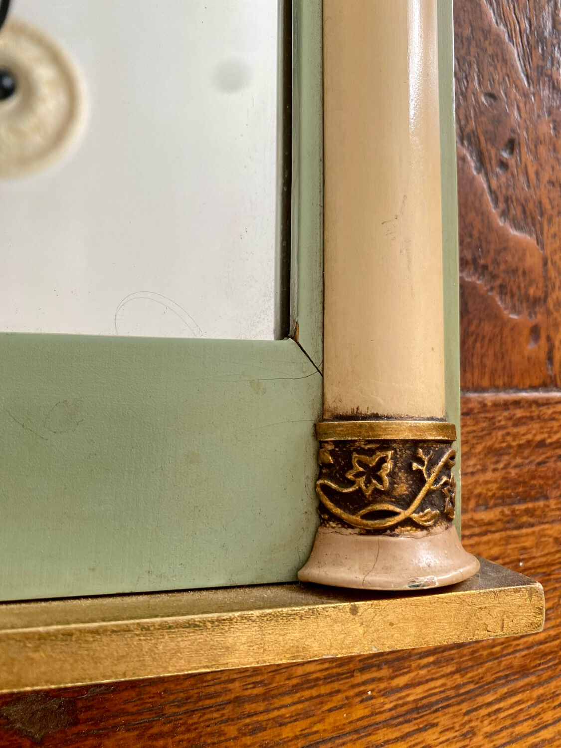 Empire style mirror with pediment