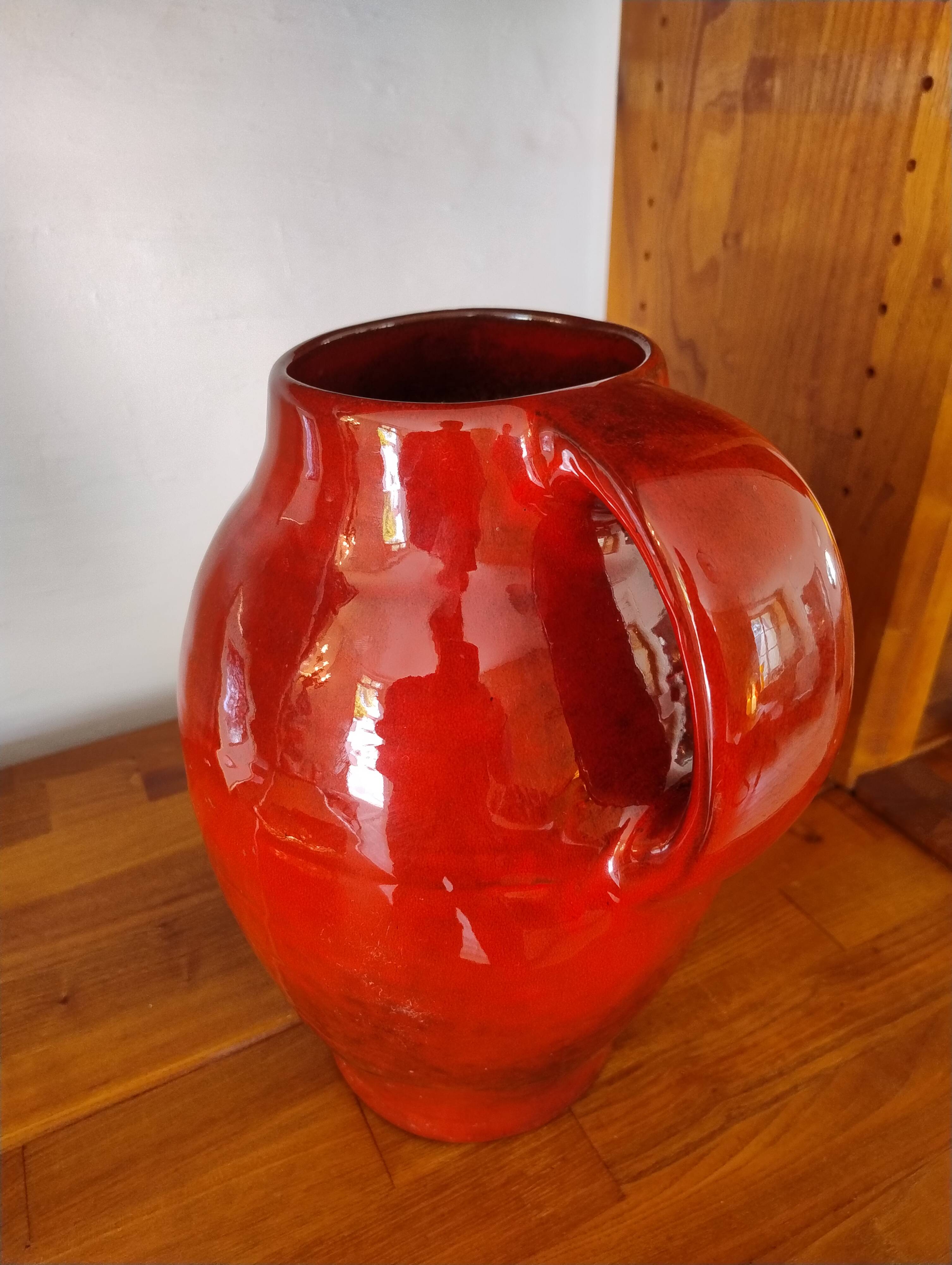 Large red jug or vase by Max Idlas
