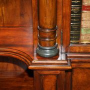 Theodore Alexander library in faux books in burl laurel.
