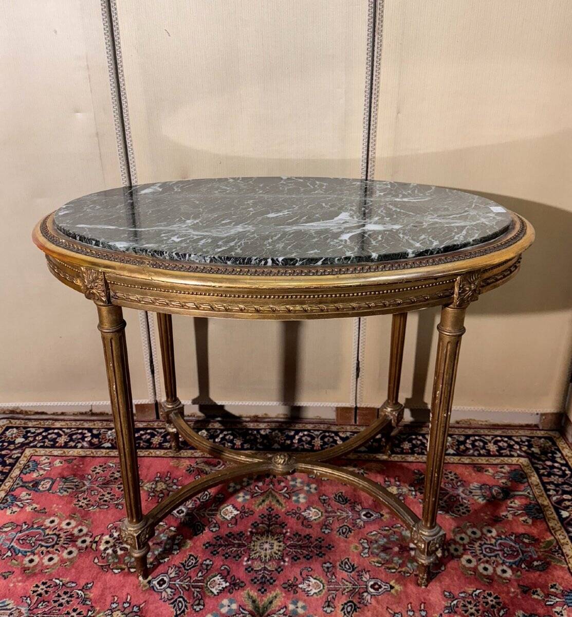 Louis XVI style pedestal table in gilded wood