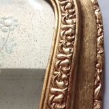 Old gilded wooden mirror