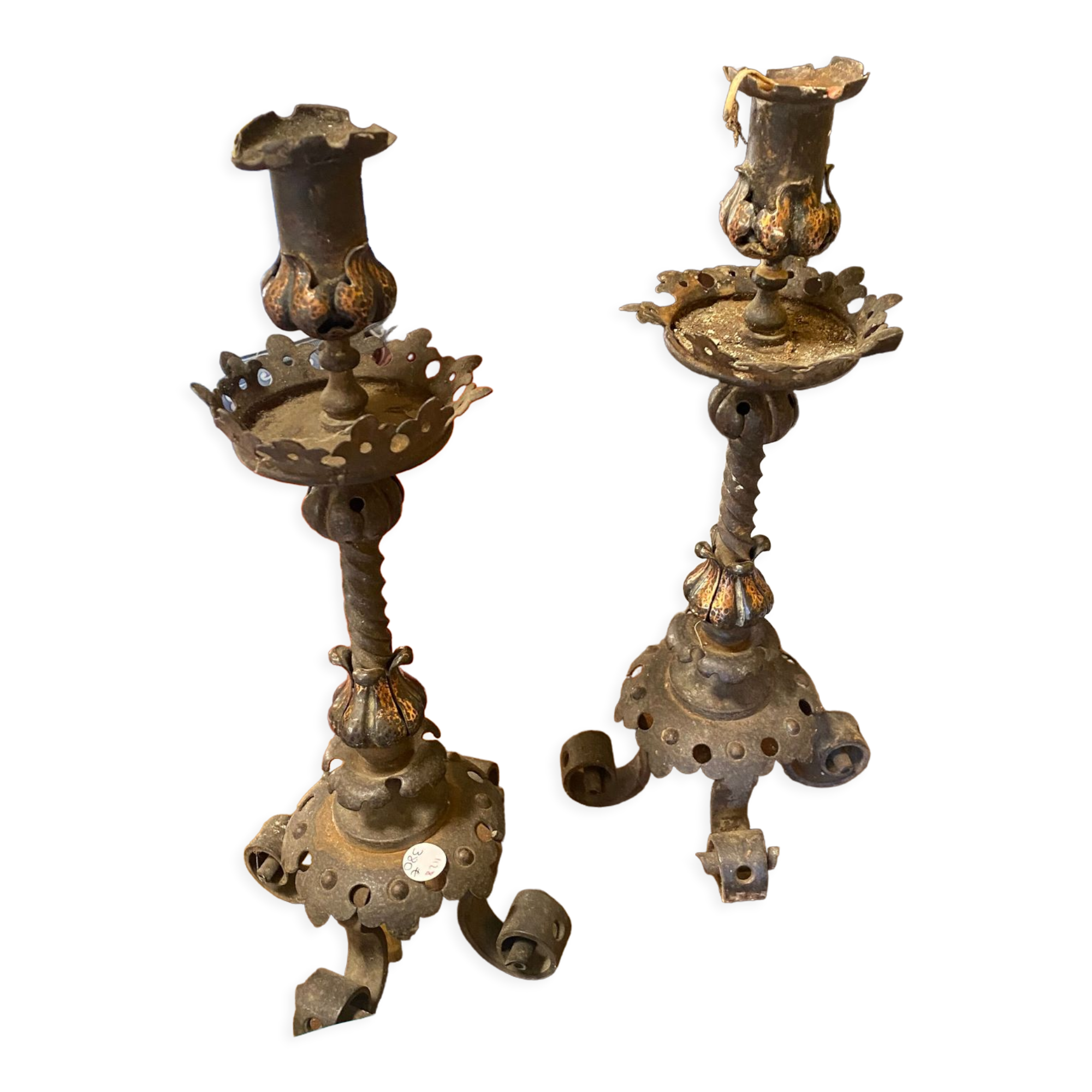 Pair of neo-gothic metal candle holders