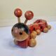 Vintage pulling toy, "centipede", 82 cm, made in Switzerland