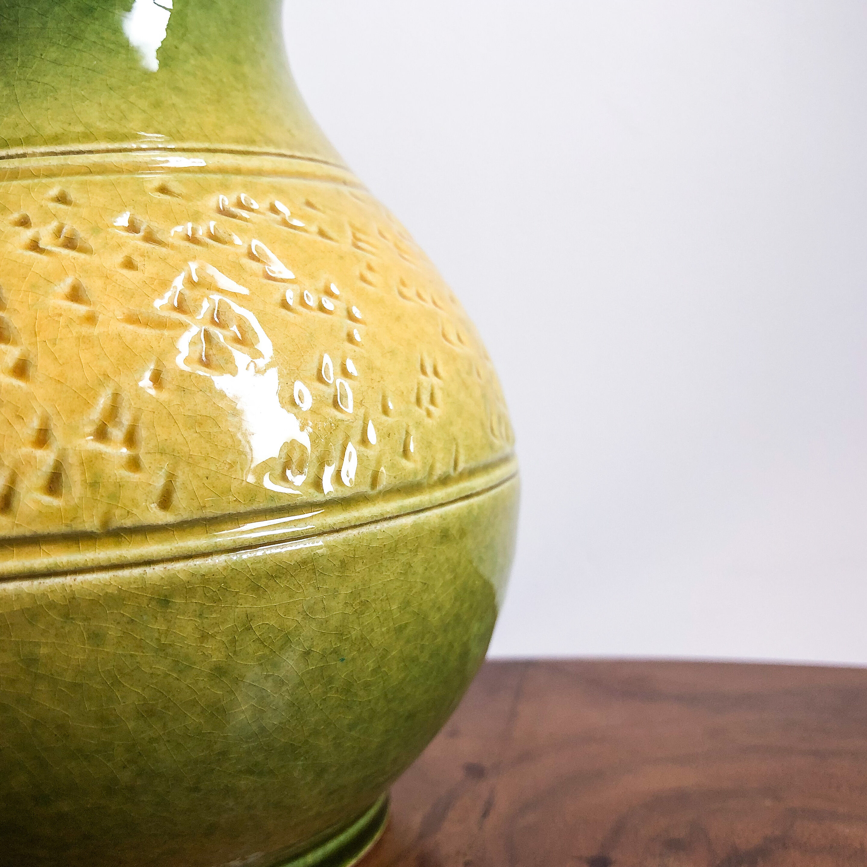 Yellow and green enamelled terracotta vase