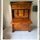 Secretary with a drop-leaf in pine and ebony, in Biedermeier style.