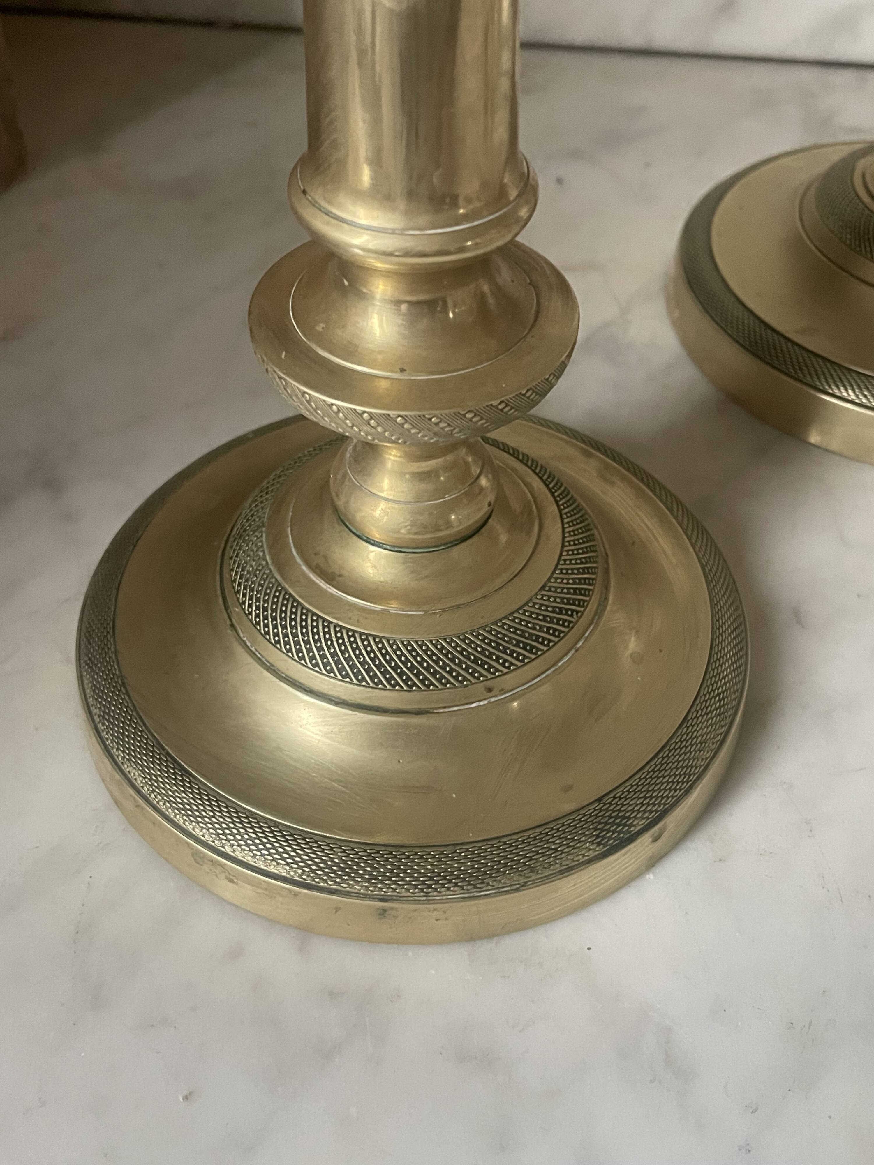 Pair of 19th century guilloche brass candlesticks